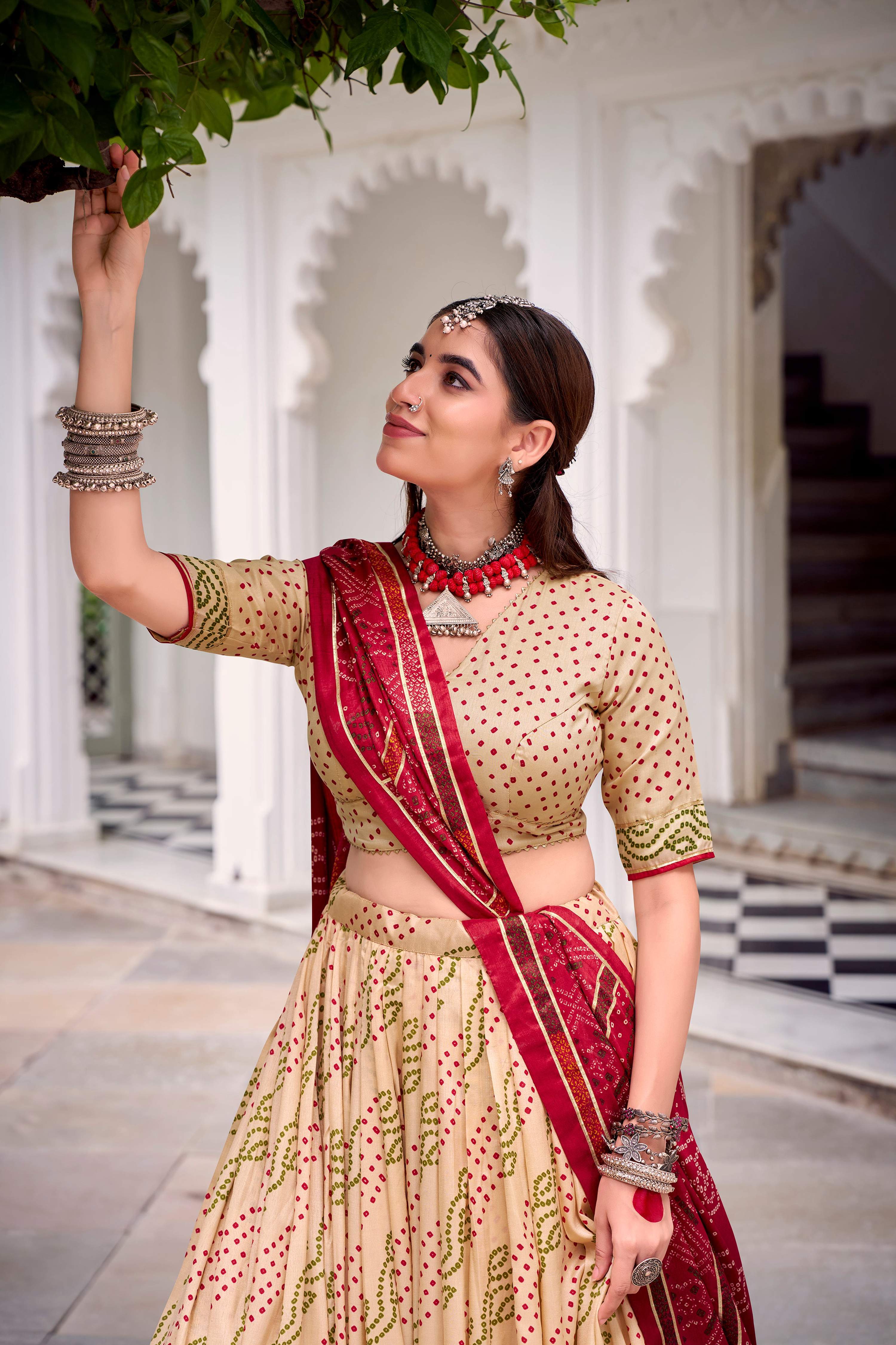 Evanik Offwhite Tassa Silk With Bandhej Print Lehenga Choli