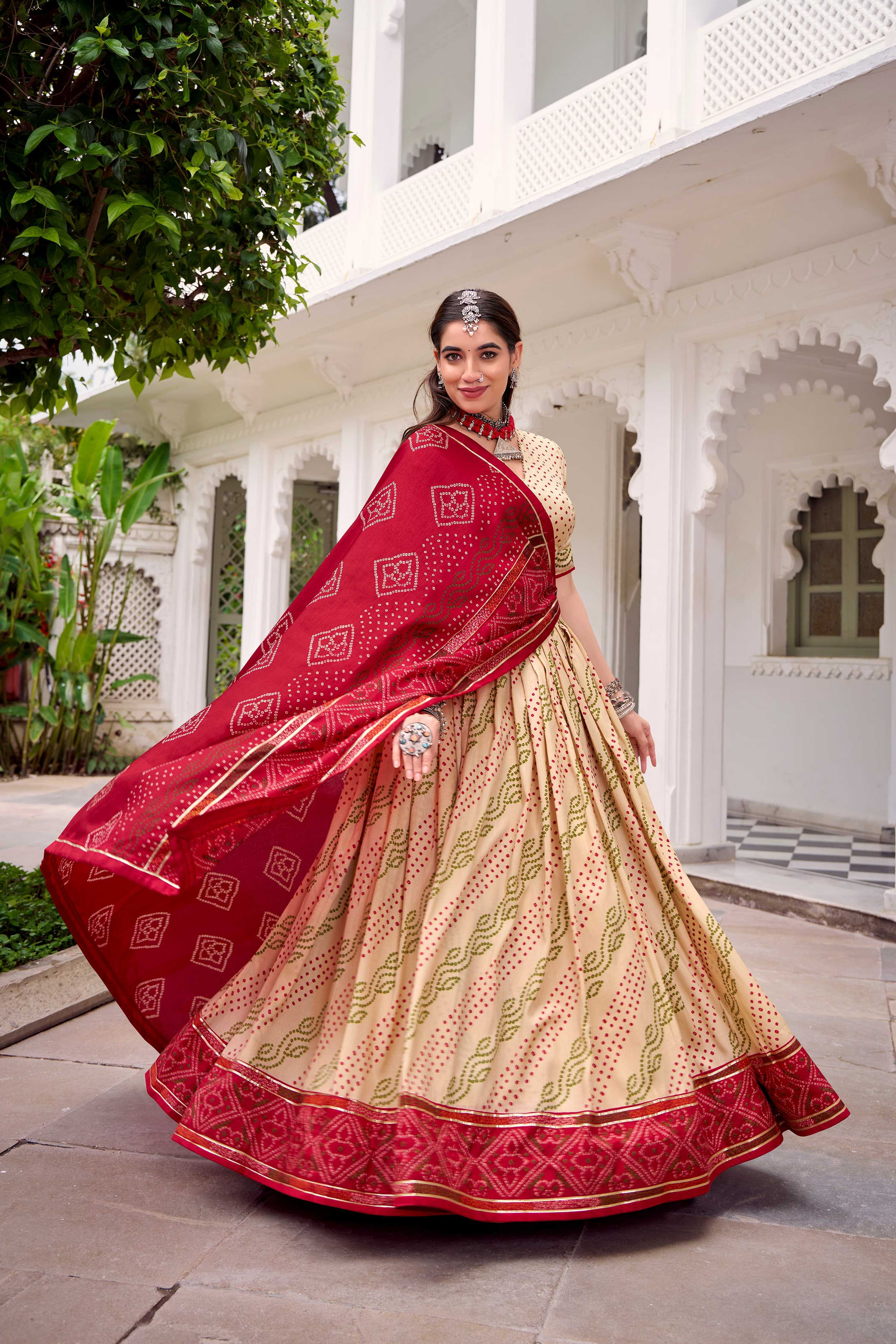 Evanik Offwhite Tassa Silk With Bandhej Print Lehenga Choli