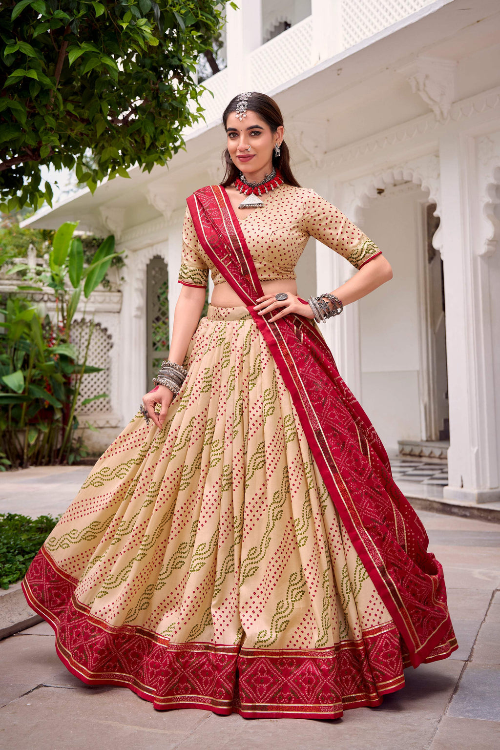 Evanik Offwhite Tassa Silk With Bandhej Print Lehenga Choli
