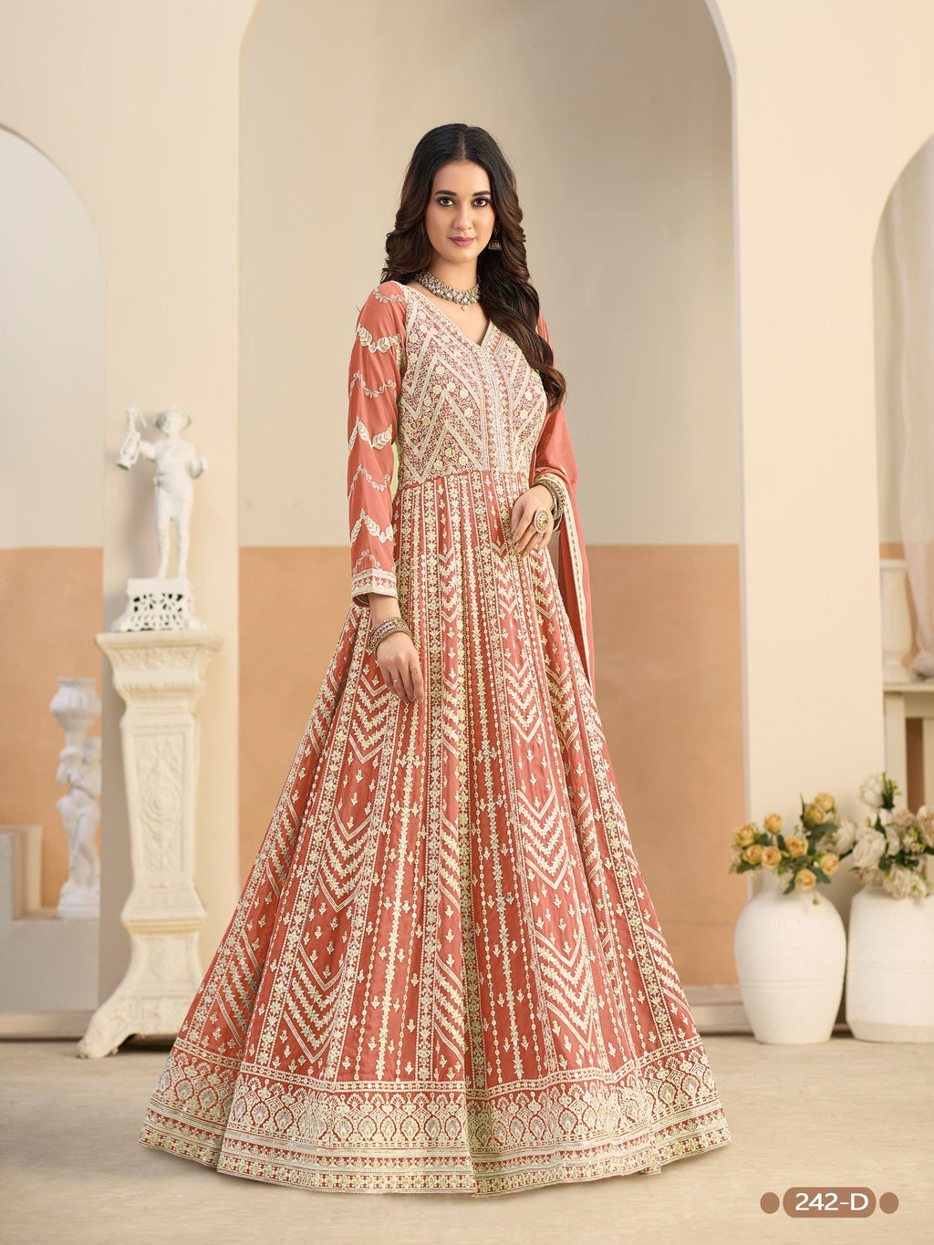 Anaita Light Orange Heavy Embroidered Faux Georgette Anarkali Suit With Salwar