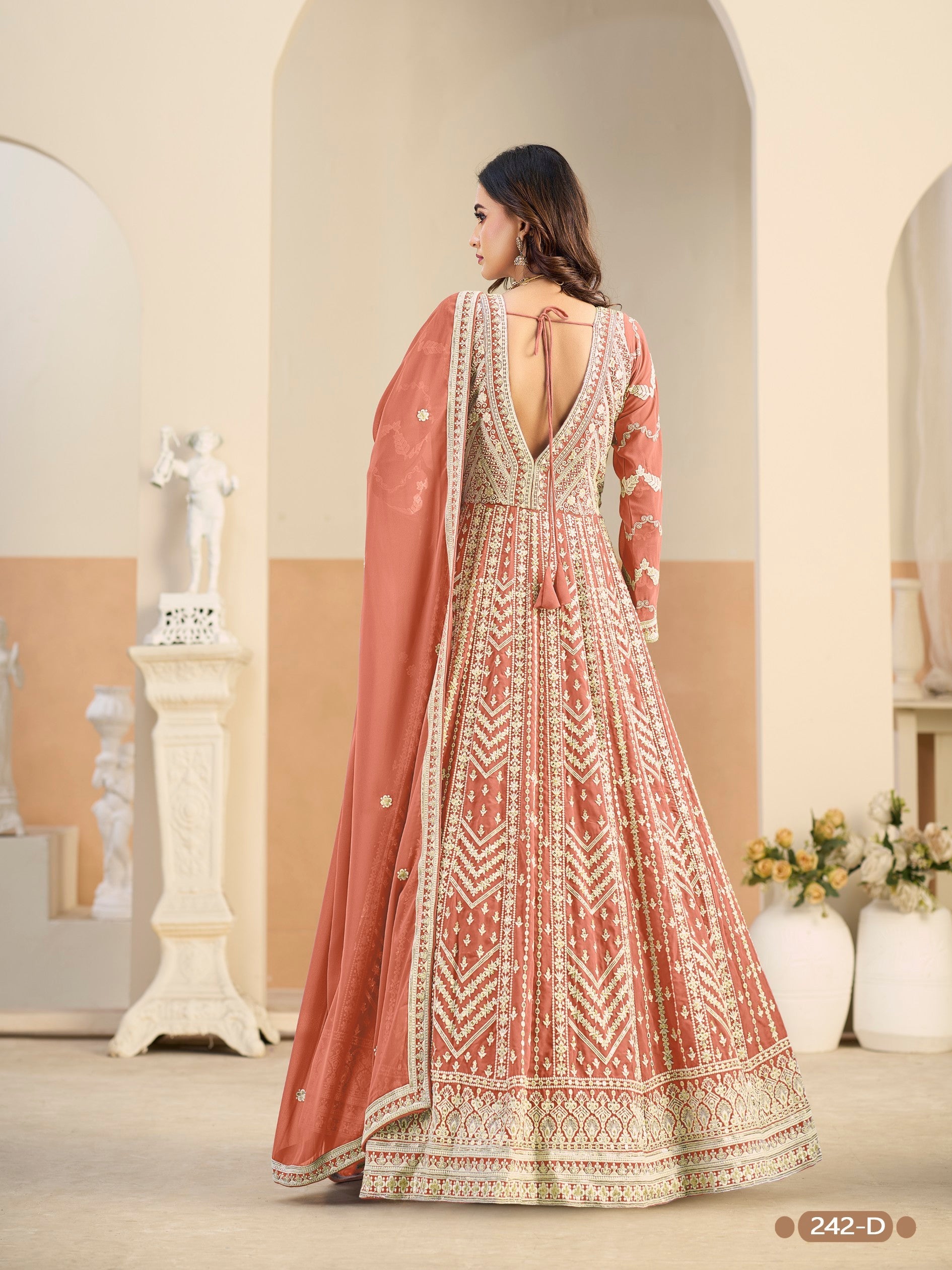 Anaita Light Orange Heavy Embroidered Faux Georgette Anarkali Suit With Salwar