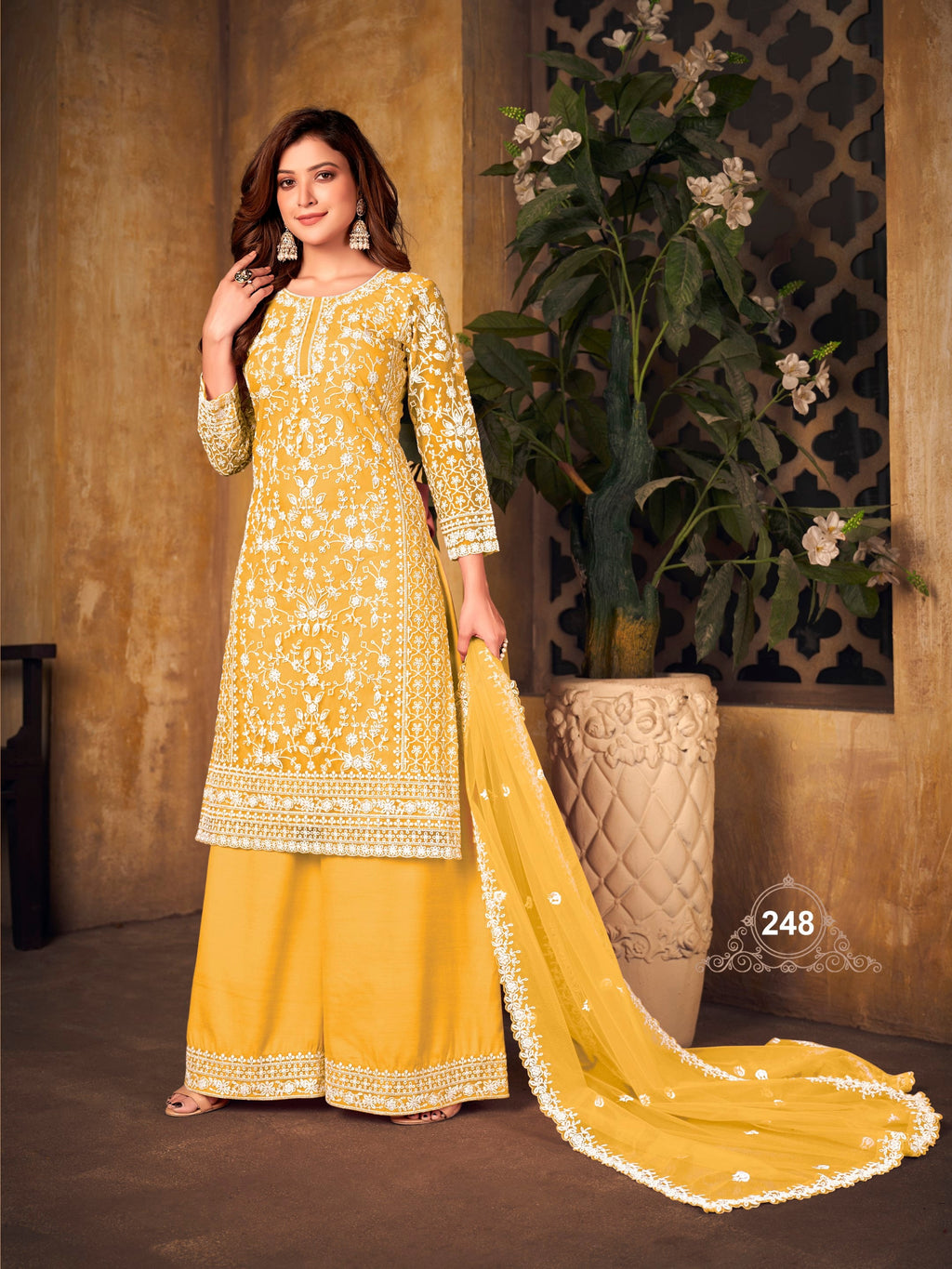 Anaita Yellow Embroidered Net Plazzo Suit