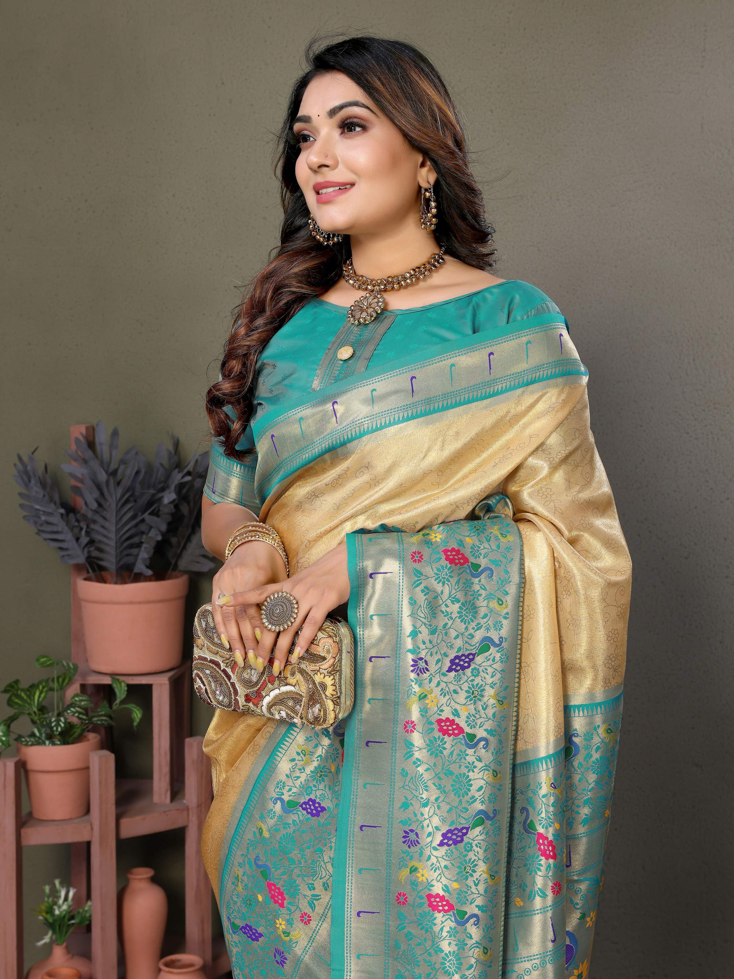 Aastha Fashion Cream Tissue Silk Paithani Woven Saree