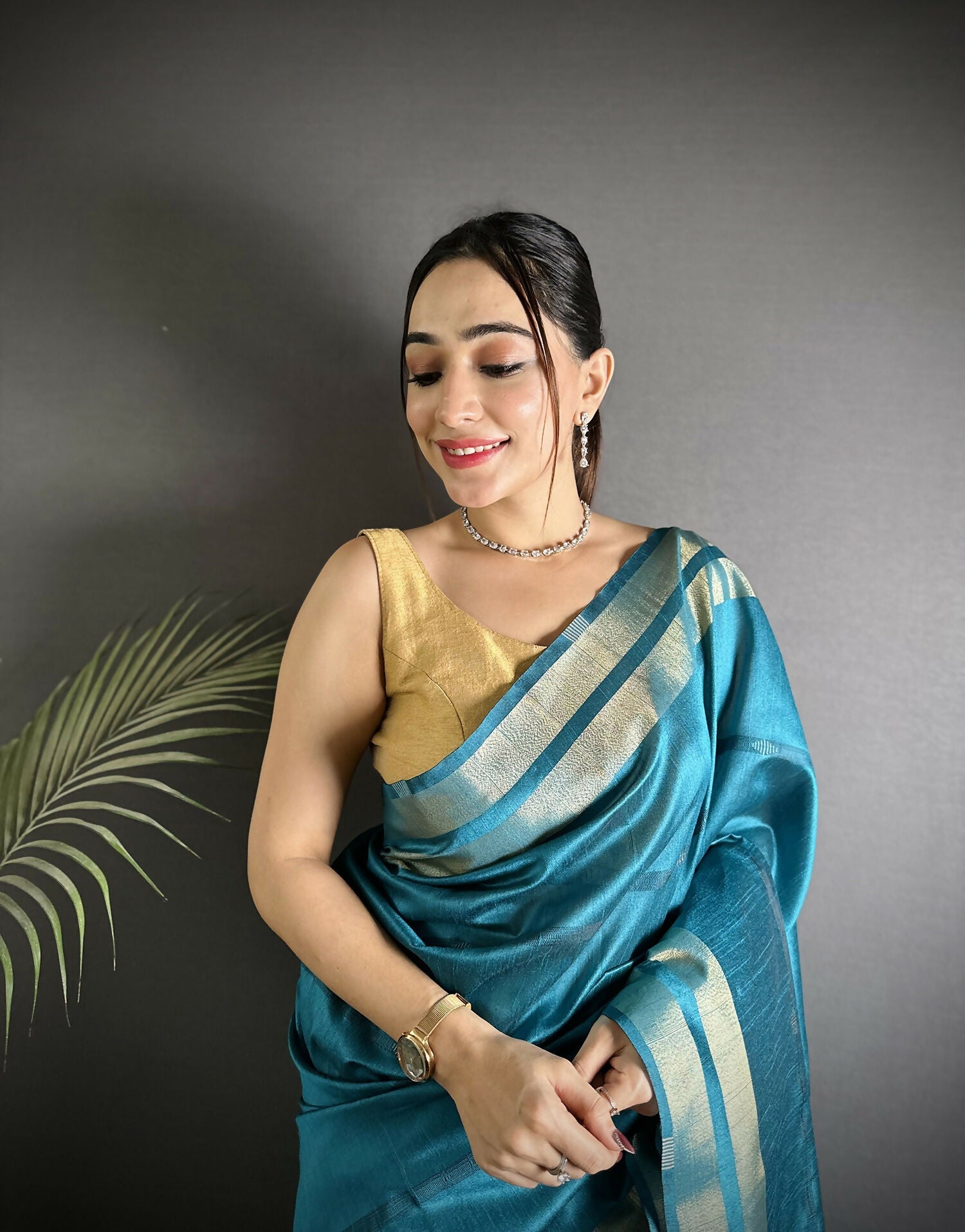 Joban Fashion Turquoise Woven Pattern Raw Silk Kanjivaram Silk Saree