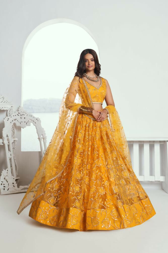 Aastha Fashion Yellow Butterfly Net Tone To Tone Cotton Thread Work And Sequence Work Embroidery Wedding Wear Lehenga Choli