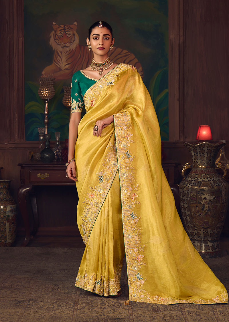 Monjolika Fashion Yellow Zari Woven Silk Blend Embroidered Saree For Wedding Wear
