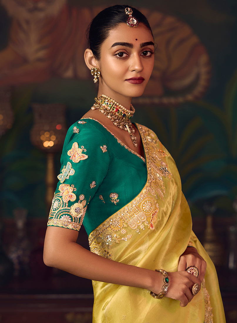 Monjolika Fashion Yellow Zari Woven Silk Blend Embroidered Saree For Wedding Wear