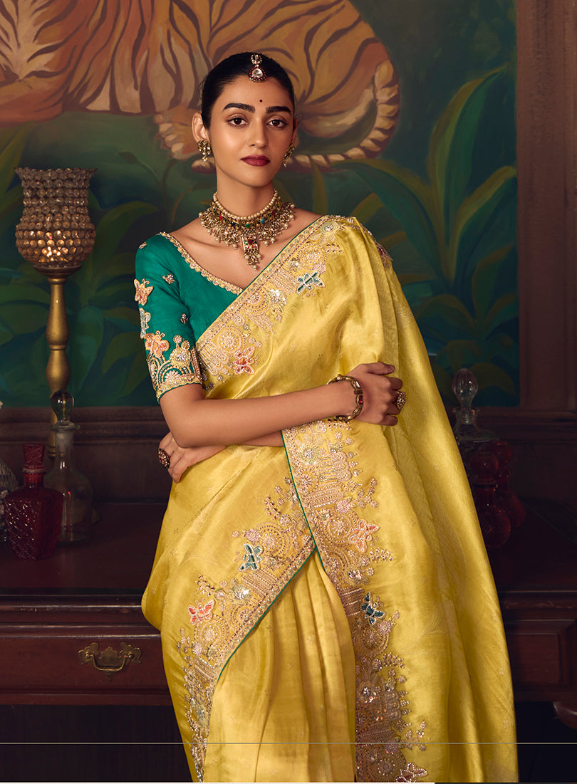 Monjolika Fashion Yellow Zari Woven Silk Blend Embroidered Saree For Wedding Wear