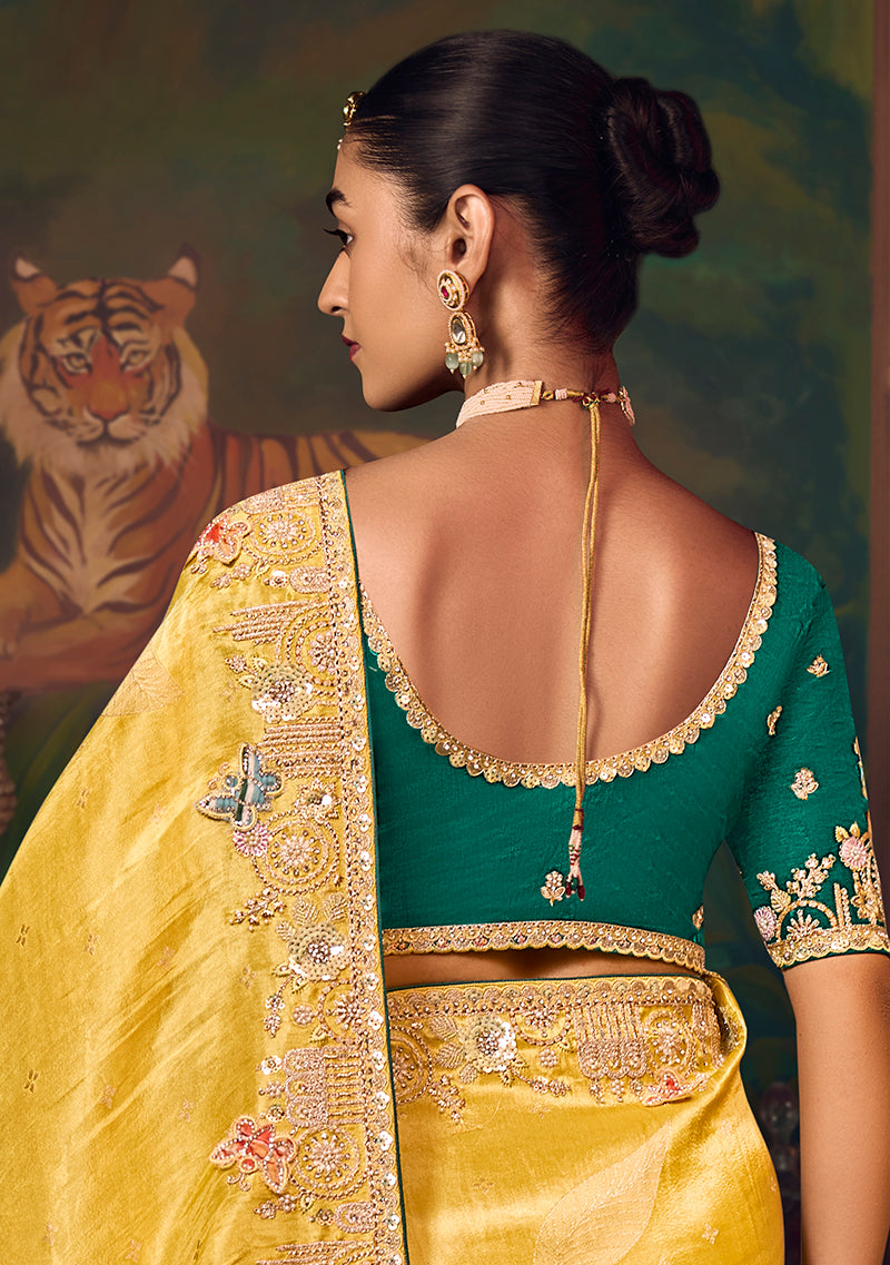 Monjolika Fashion Yellow Zari Woven Silk Blend Embroidered Saree For Wedding Wear