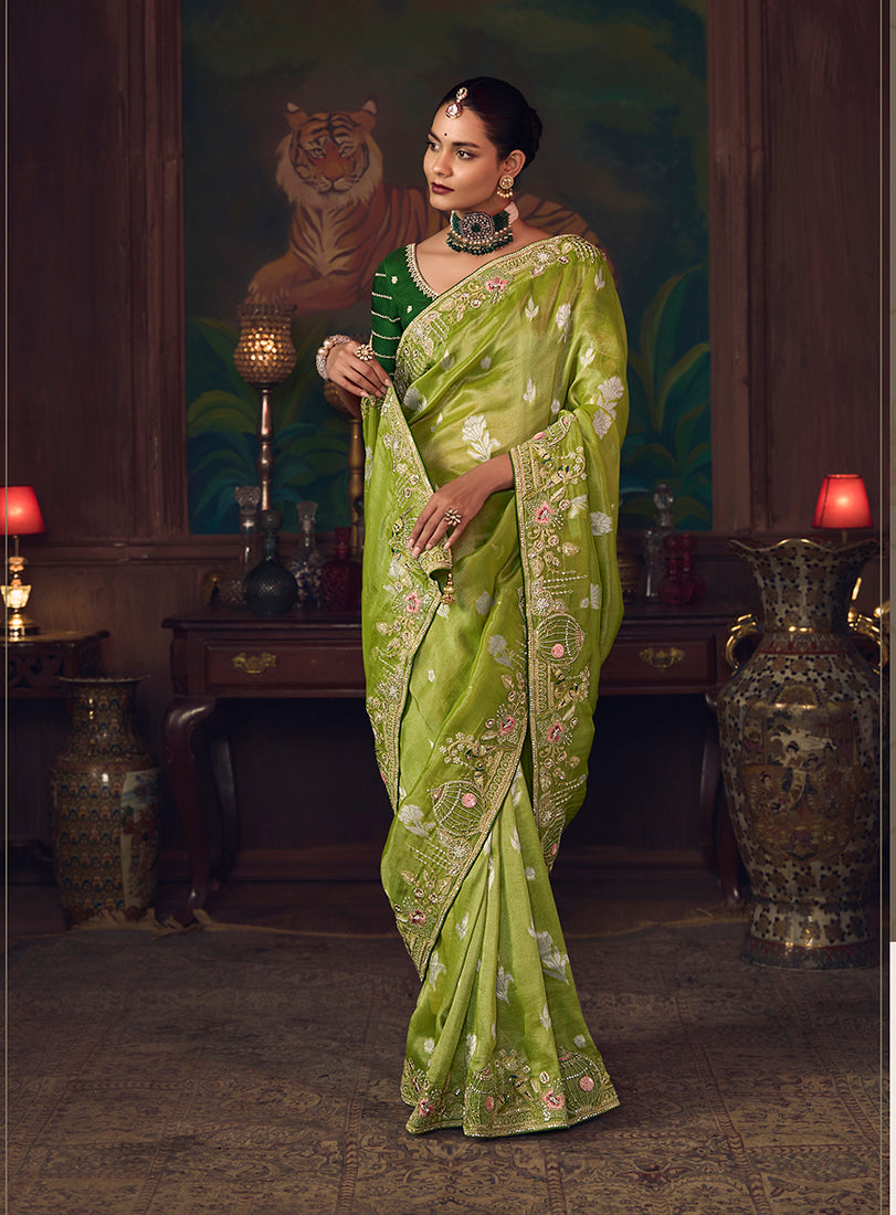 Monjolika Fashion Parrot Green Zari Woven Silk Blend Embroidered Saree For Wedding Wear