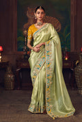 Monjolika Fashion Light Green Zari Woven Silk Blend Embroidered Saree For Wedding Wear