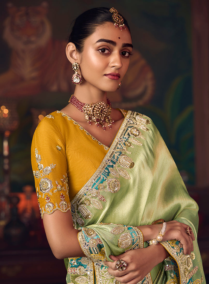 Monjolika Fashion Light Green Zari Woven Silk Blend Embroidered Saree For Wedding Wear