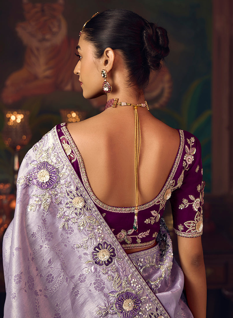 Monjolika Fashion Lavender Zari Woven Silk Blend Embroidered Saree For Wedding Wear