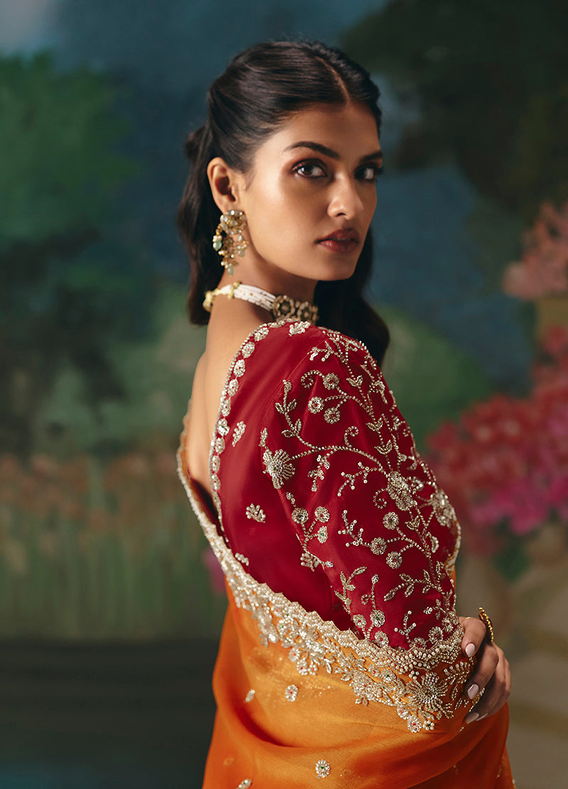 Monjolika Fashion Fancy Fabric Embroidered Saree in Orange