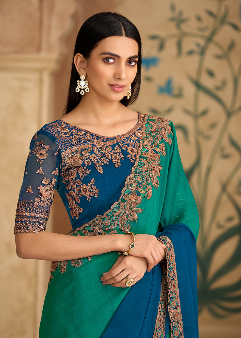 Monjolika Fashion Embroidered Faux Chiffon Teal Green & Blue Saree