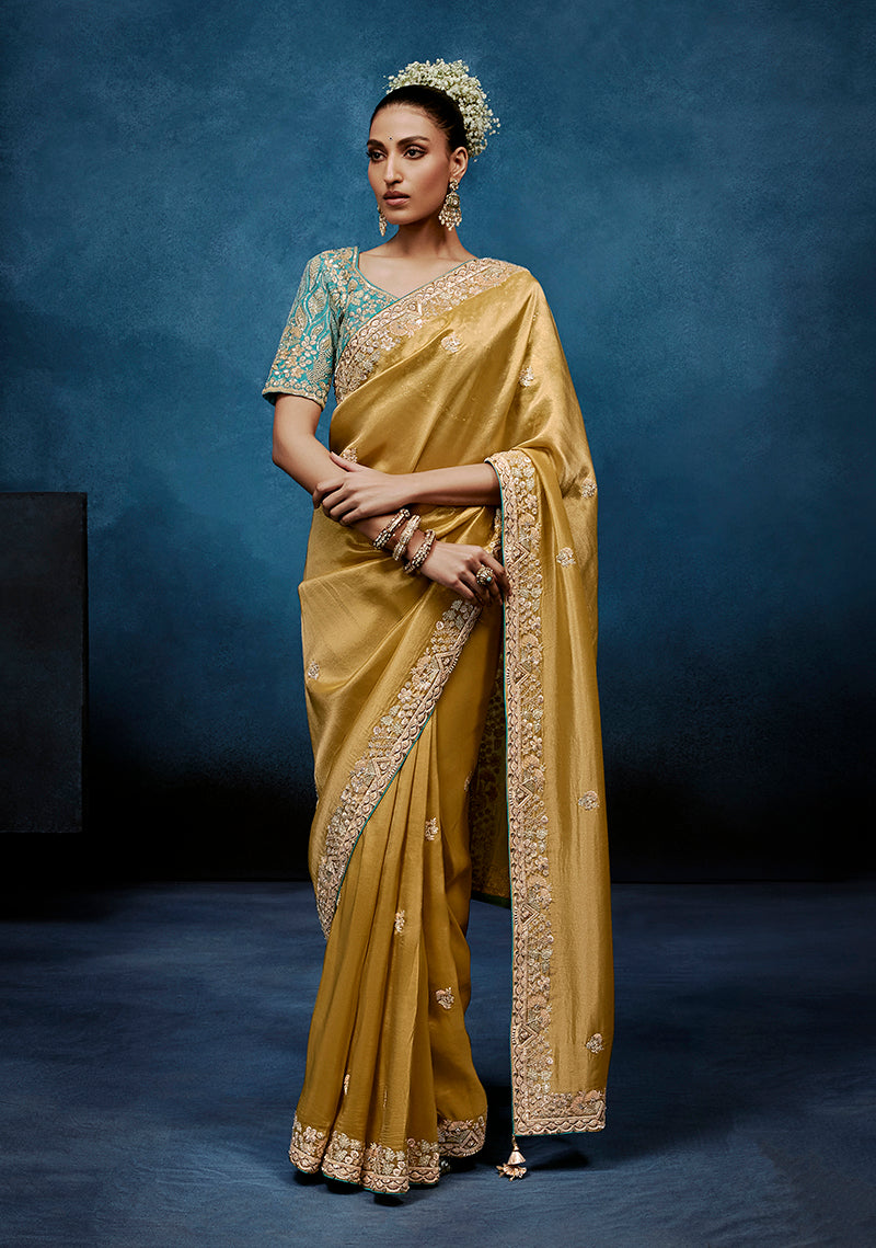 Monjolika Fashion Gold Fancy Fabric Embroidered Saree With Stitched Blouse