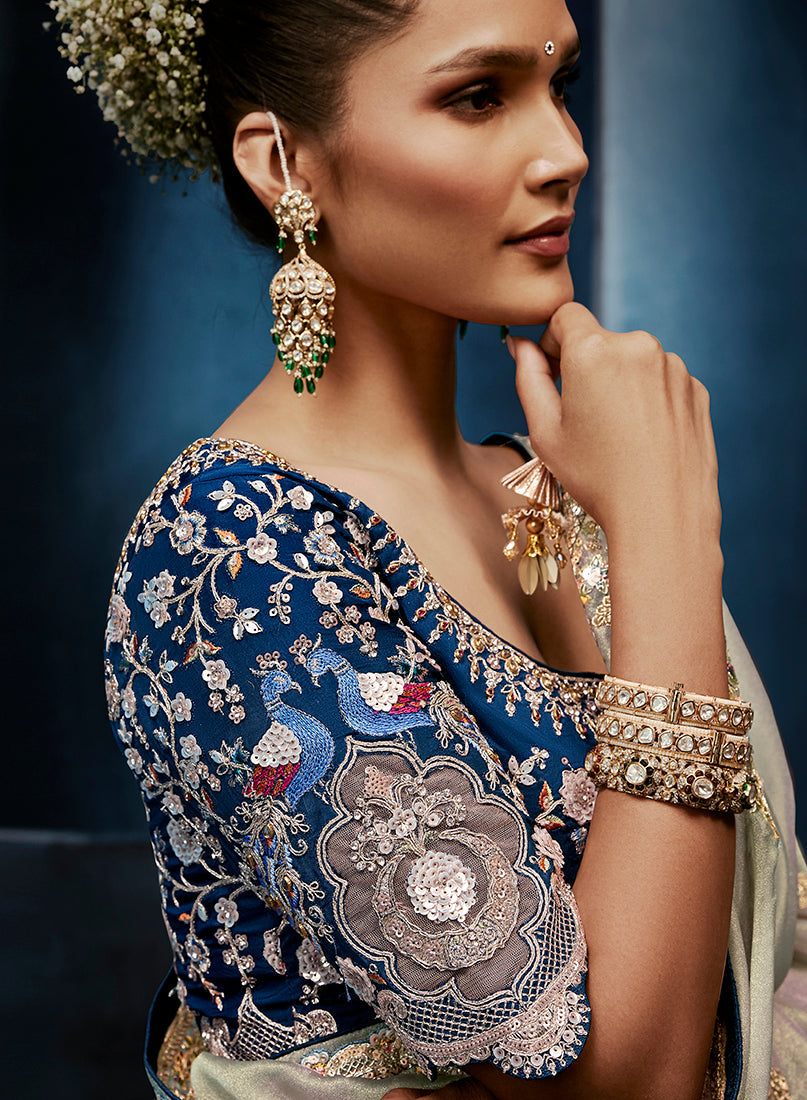 Monjolika Fashion Light Grey Fancy Fabric Embroidered Saree With Stitched Blouse