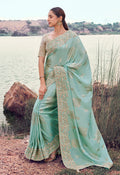 Monjolika Fashion Light Sky Blue Embroidered Woven Faux Tissue Silk Saree
