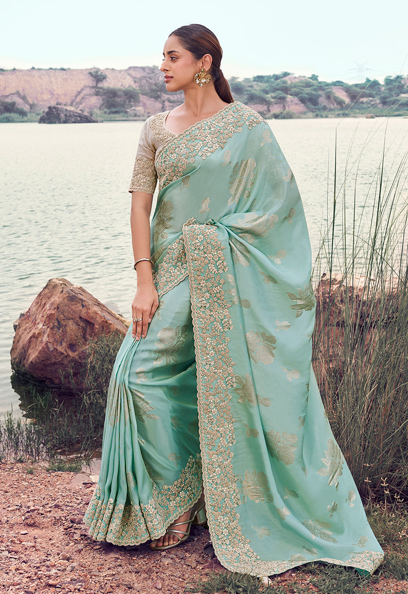 Monjolika Fashion Light Sky Blue Embroidered Woven Faux Tissue Silk Saree