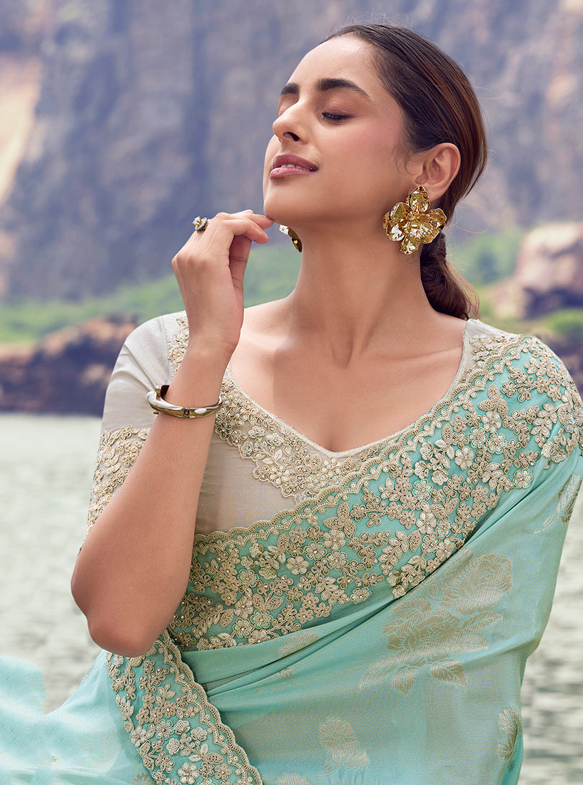 Monjolika Fashion Light Sky Blue Embroidered Woven Faux Tissue Silk Saree
