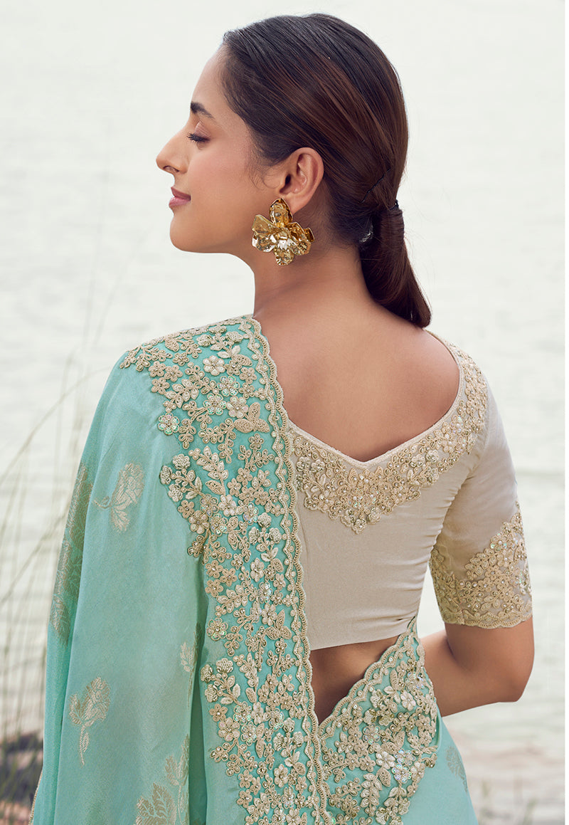 Monjolika Fashion Light Sky Blue Embroidered Woven Faux Tissue Silk Saree