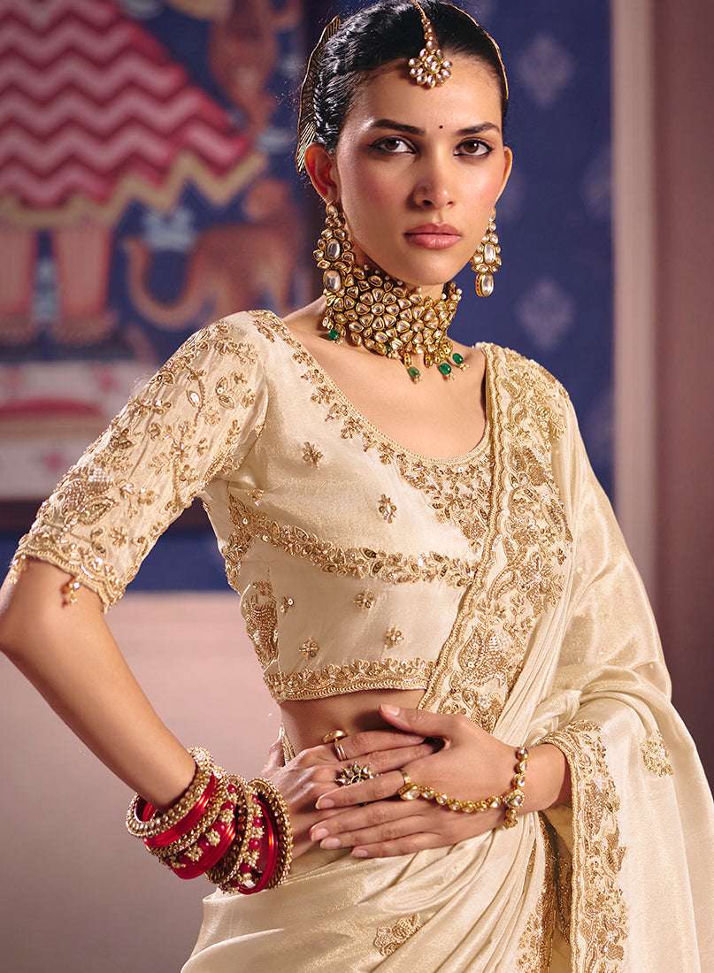 Monjolika Fashion Cream Viscose Zari Tissue Silk Embroidered Saree