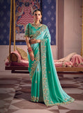 Monjolika Fashion Turquoise Viscose Zari Tissue Silk Embroidered Saree