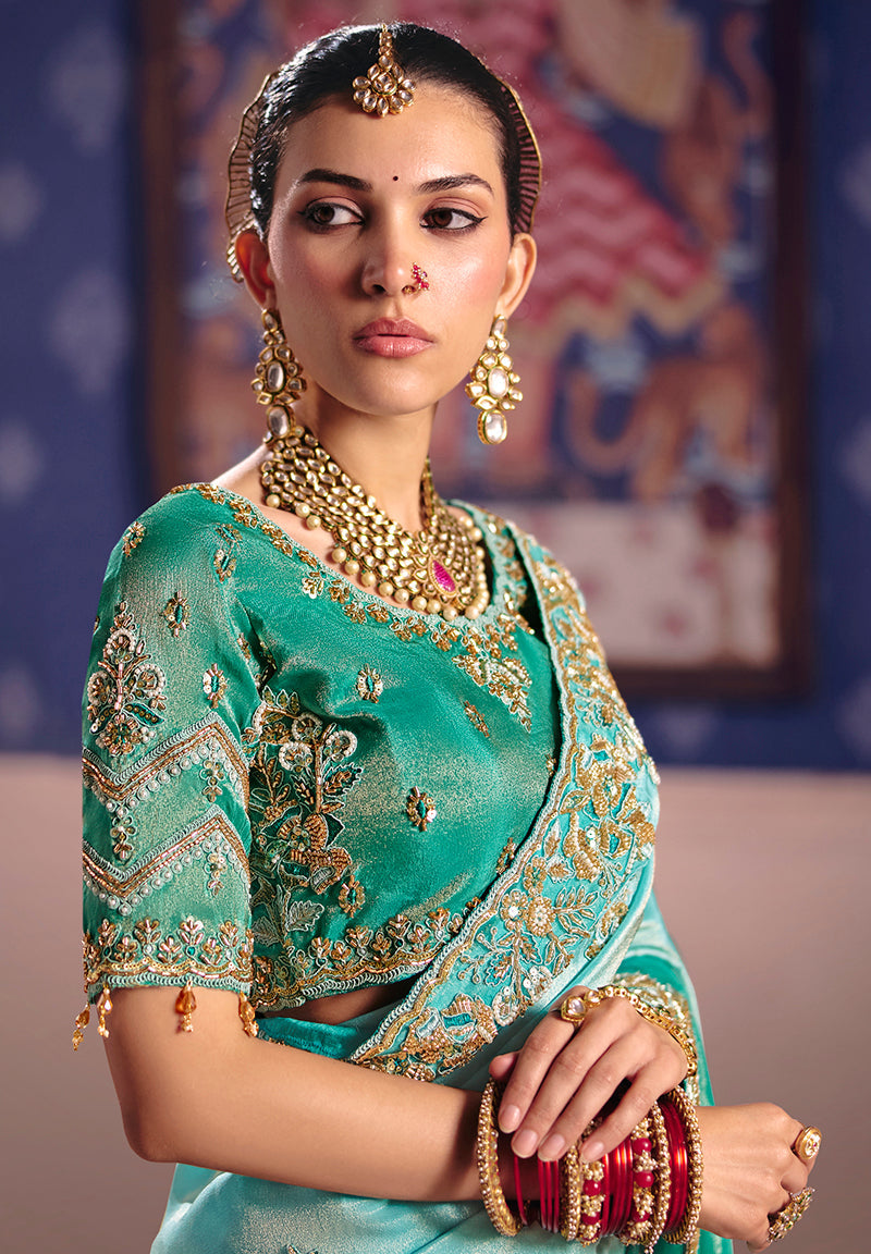 Monjolika Fashion Turquoise Viscose Zari Tissue Silk Embroidered Saree