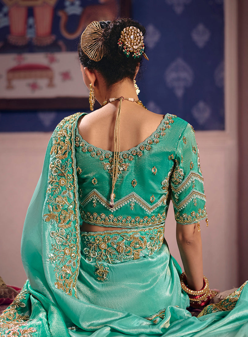 Monjolika Fashion Turquoise Viscose Zari Tissue Silk Embroidered Saree