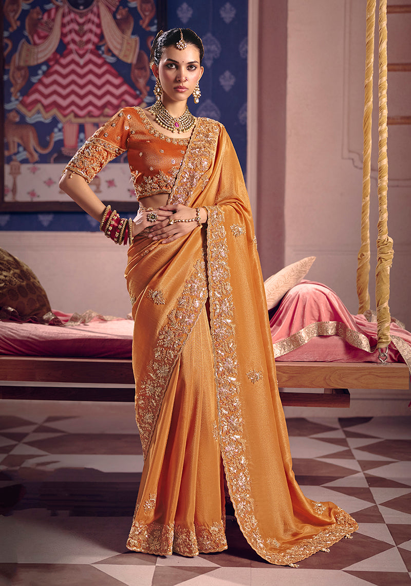 Monjolika Fashion Orange Viscose Zari Tissue Silk Embroidered Saree
