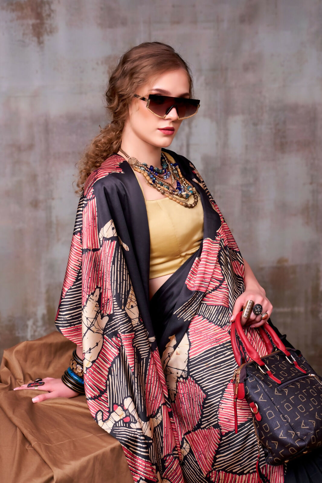 Vastranavya Black Satin Silk Printed Saree with a Natural Silk Unstitched Blouse