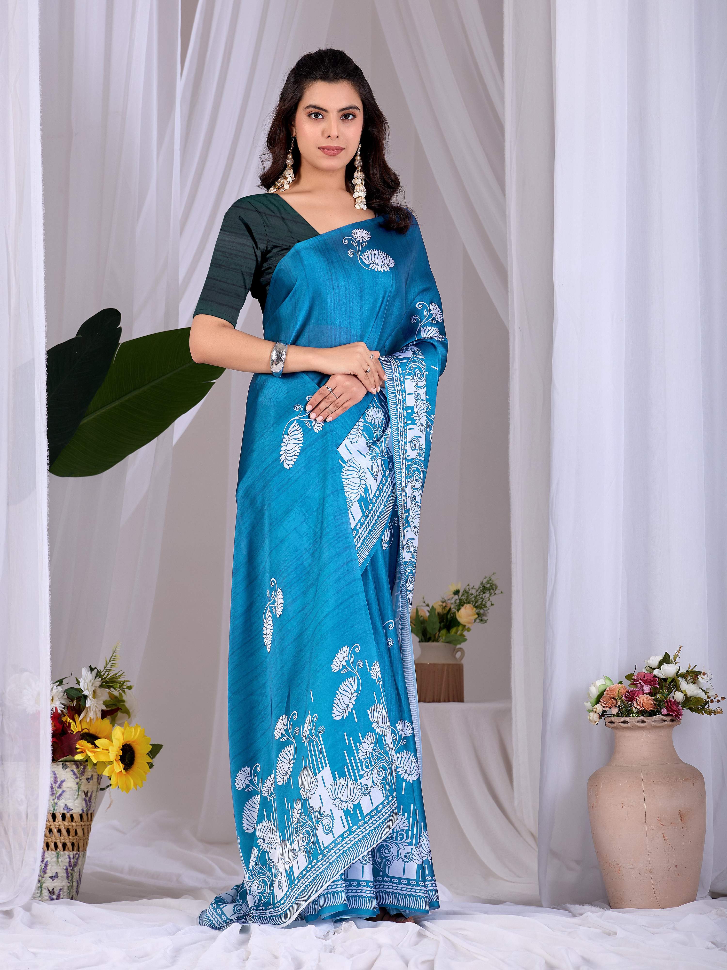 Aastha Fashion Teal Blue Soft Satin Georgette Printed Saree