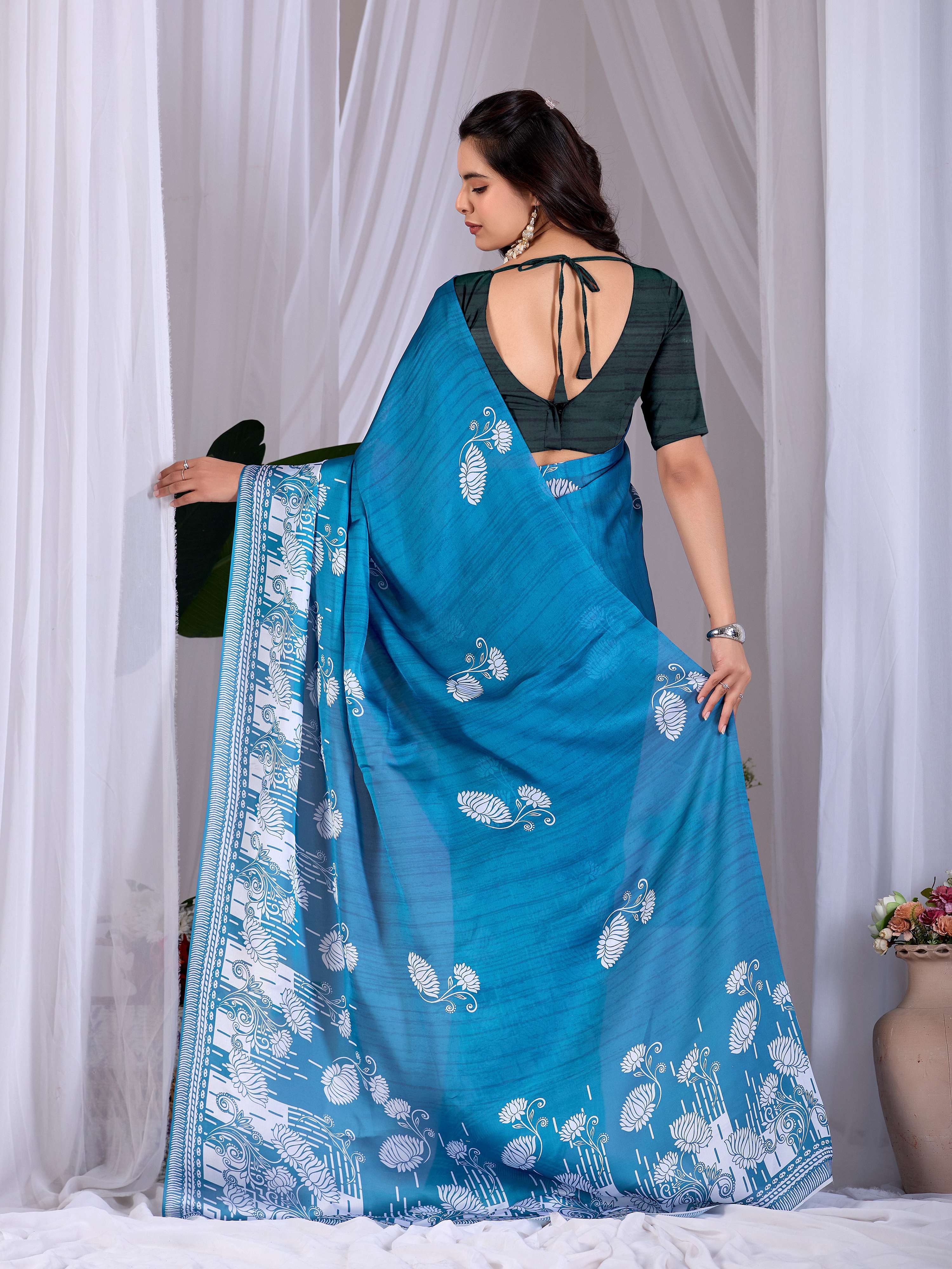 Aastha Fashion Teal Blue Soft Satin Georgette Printed Saree
