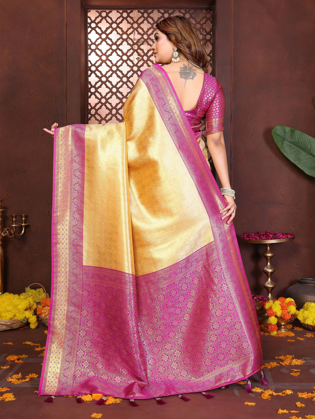 Aastha Fashion Cream Tissue Silk Woven Saree