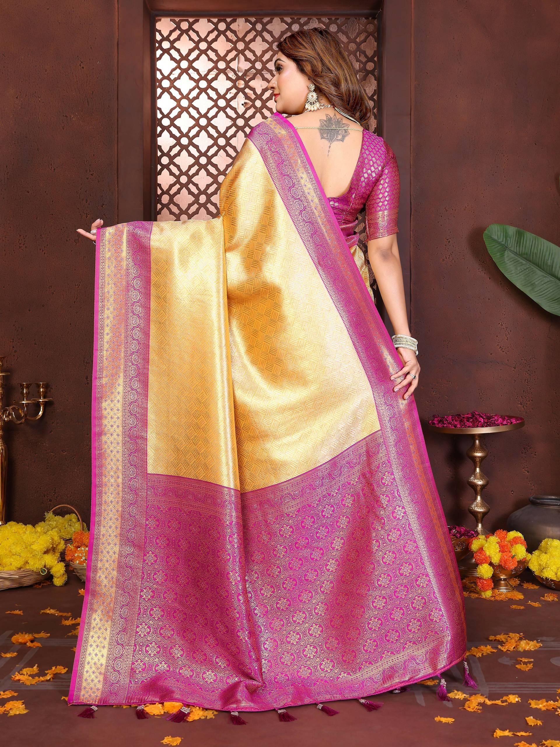Aastha Fashion Cream Tissue Silk Woven Saree
