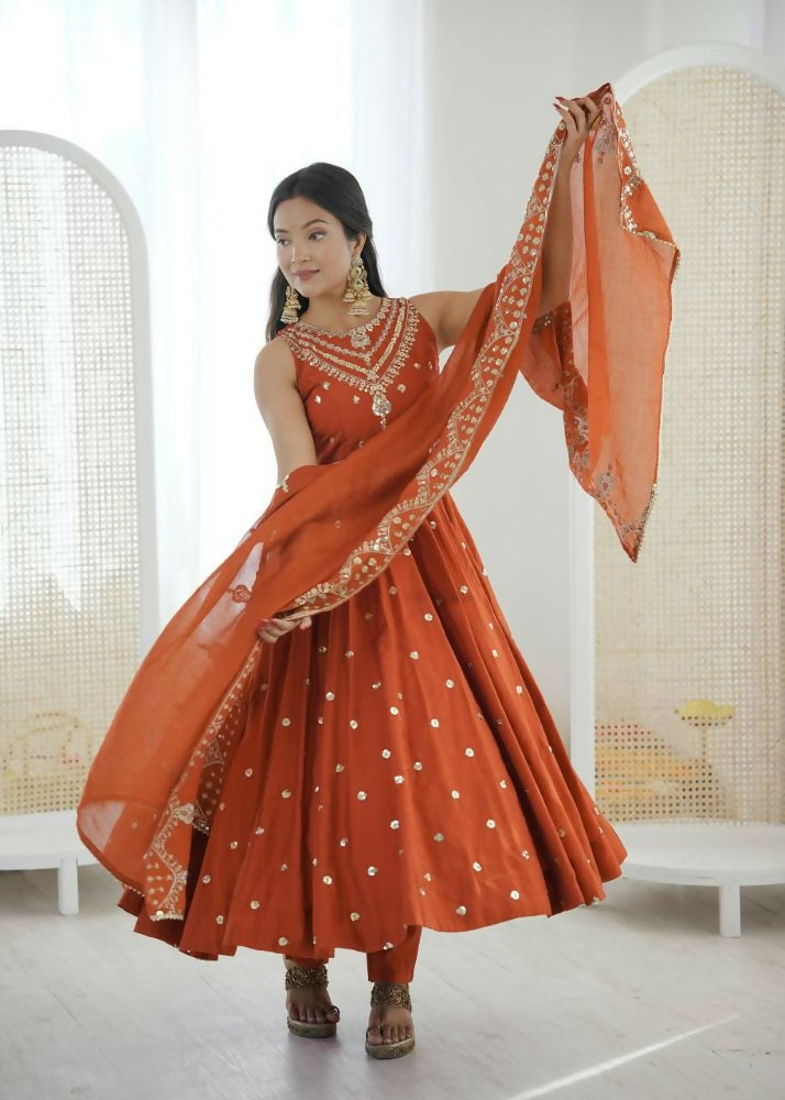 Teeya Creation Orange Color Roman Silk Embroidery Work Party Wear Gown