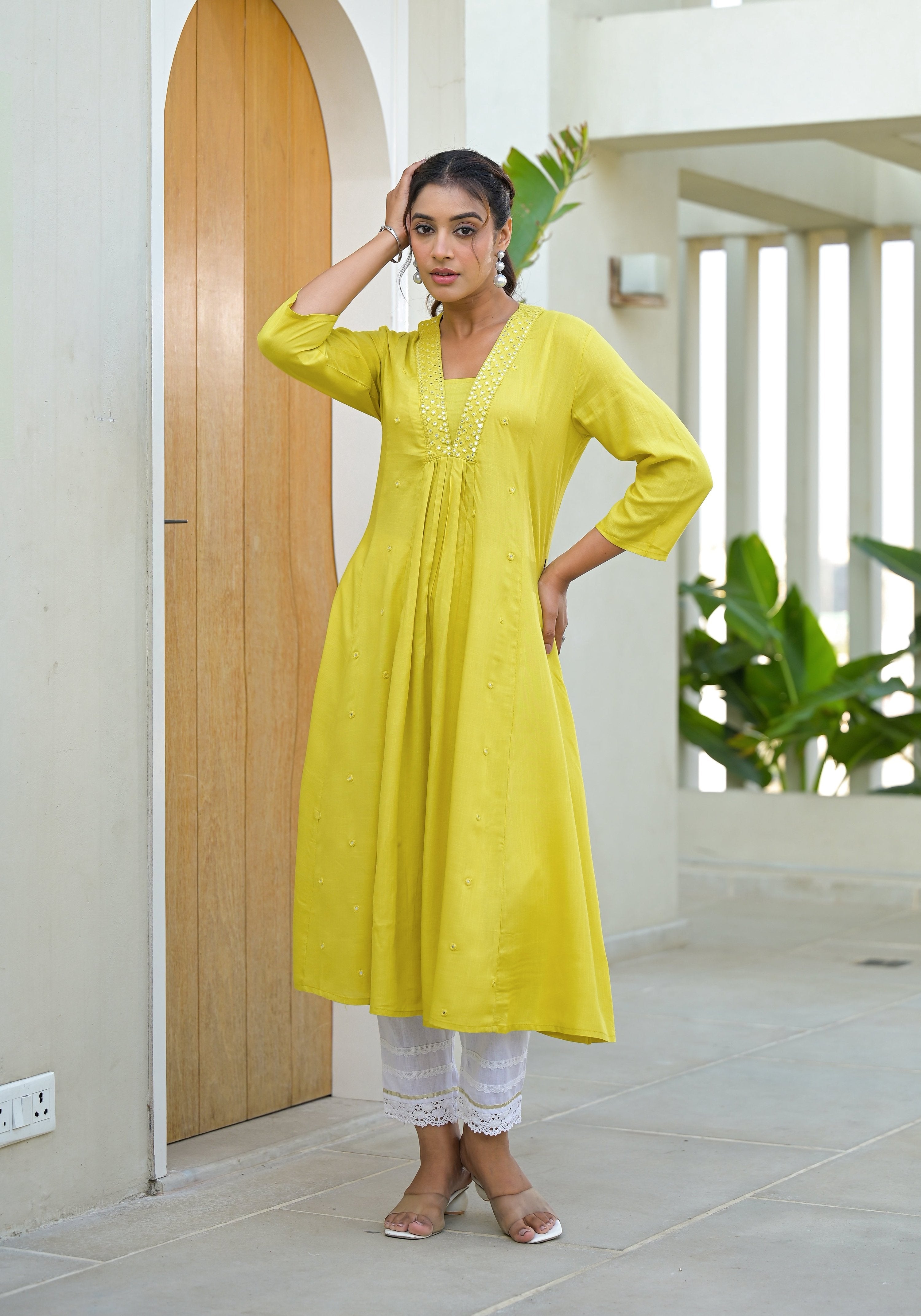 Juniper Yellow Solid Liva Rayon Kurta With Mirror Work
