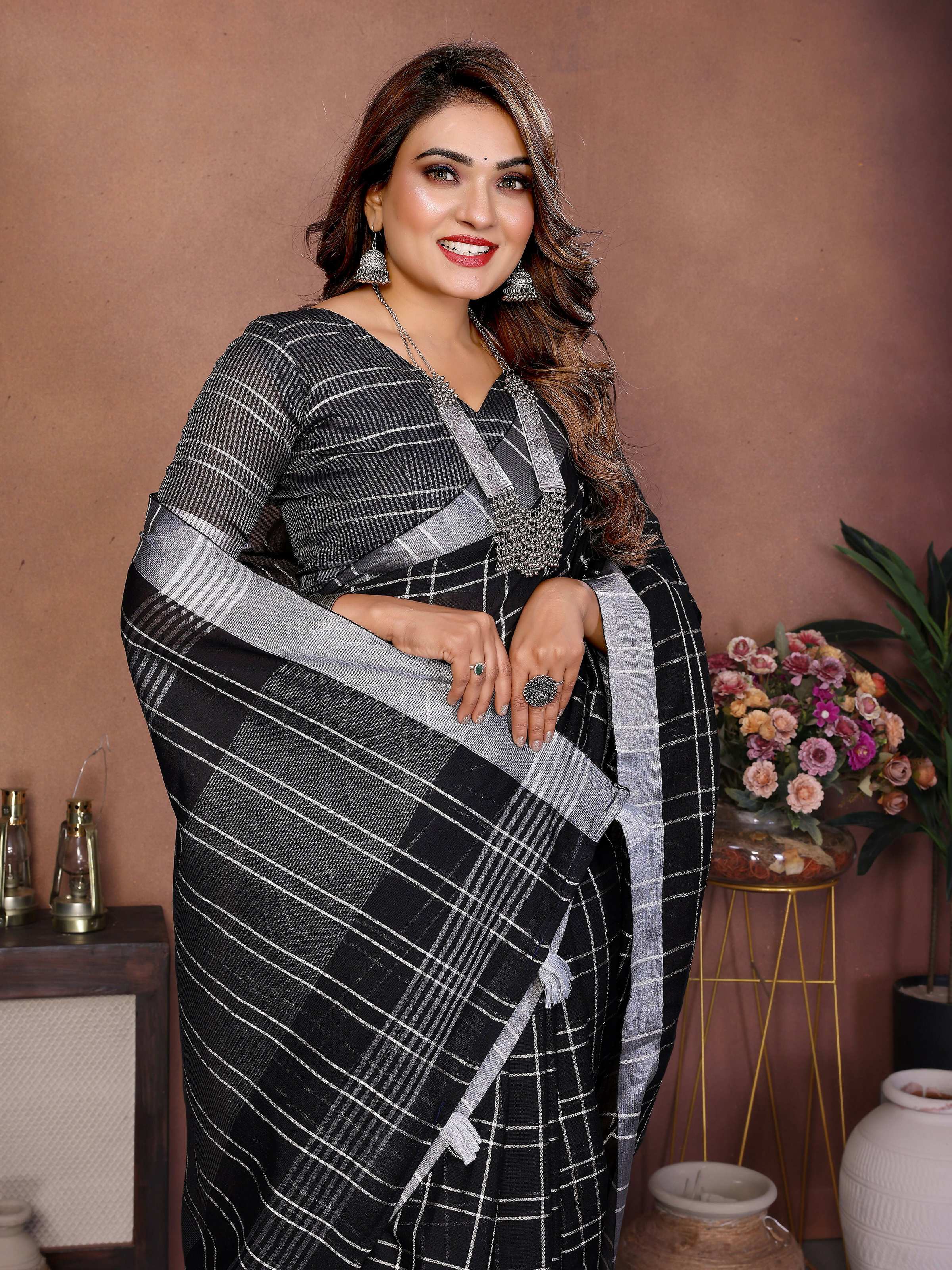 Aastha Fashion Black Linen Weaving Saree