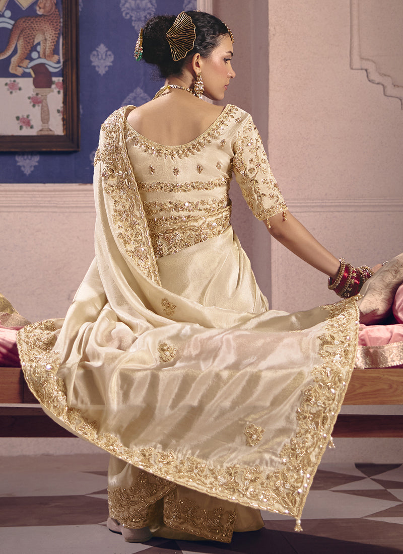 Vegaa Fashion Cream Silk Embroidered Wedding Wear Saree