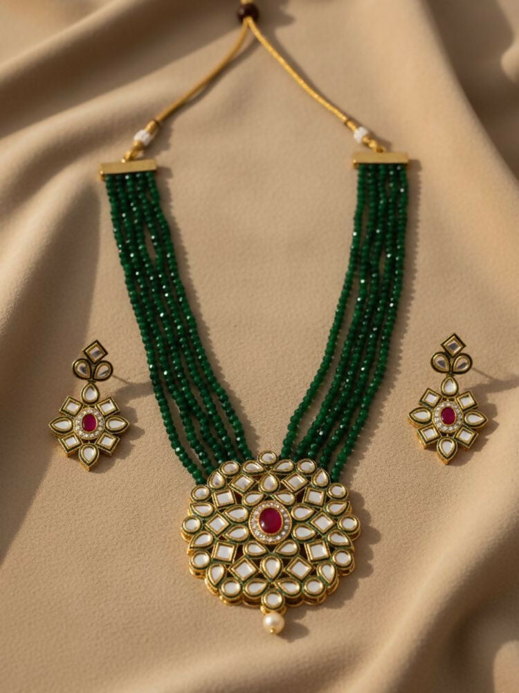 NVR Women Gold Plated Green Kundan Jewellery Set
