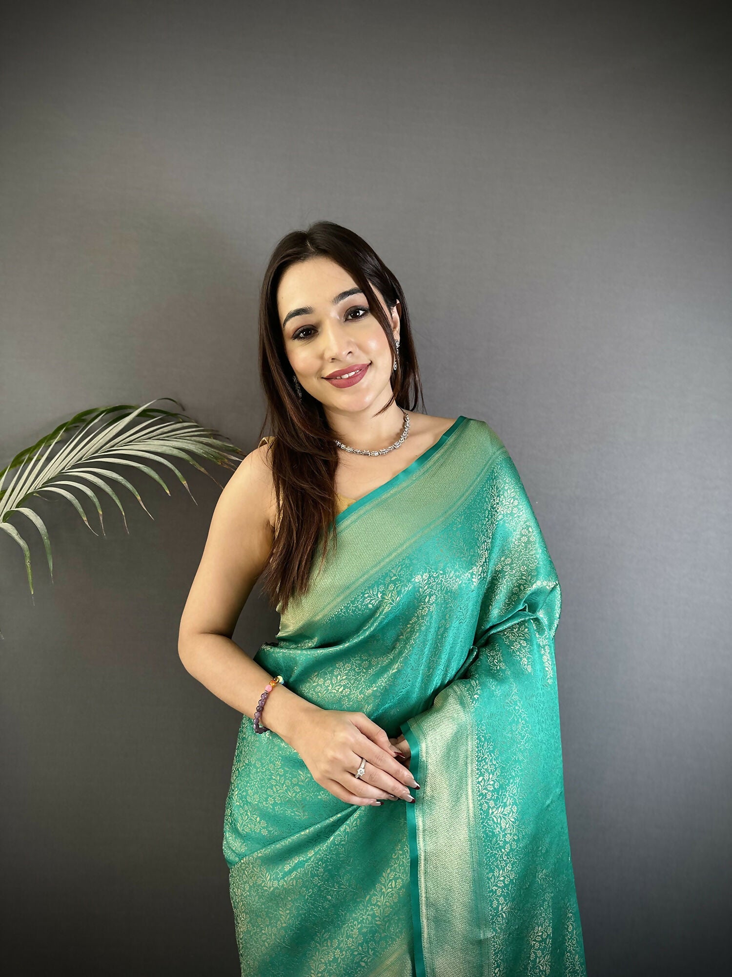 Joban Fashion Teal Floral Motifs & Ethnic Design Soft Satin Silk Kanchipuram Saree