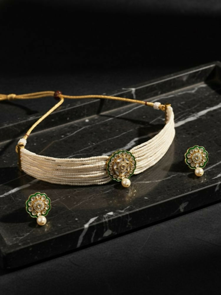 NVR Women Gold Plated White Kundan Jewellery Set