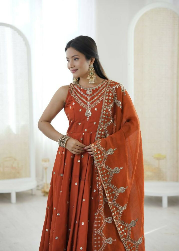 Teeya Creation Orange Color Roman Silk Embroidery Work Party Wear Gown