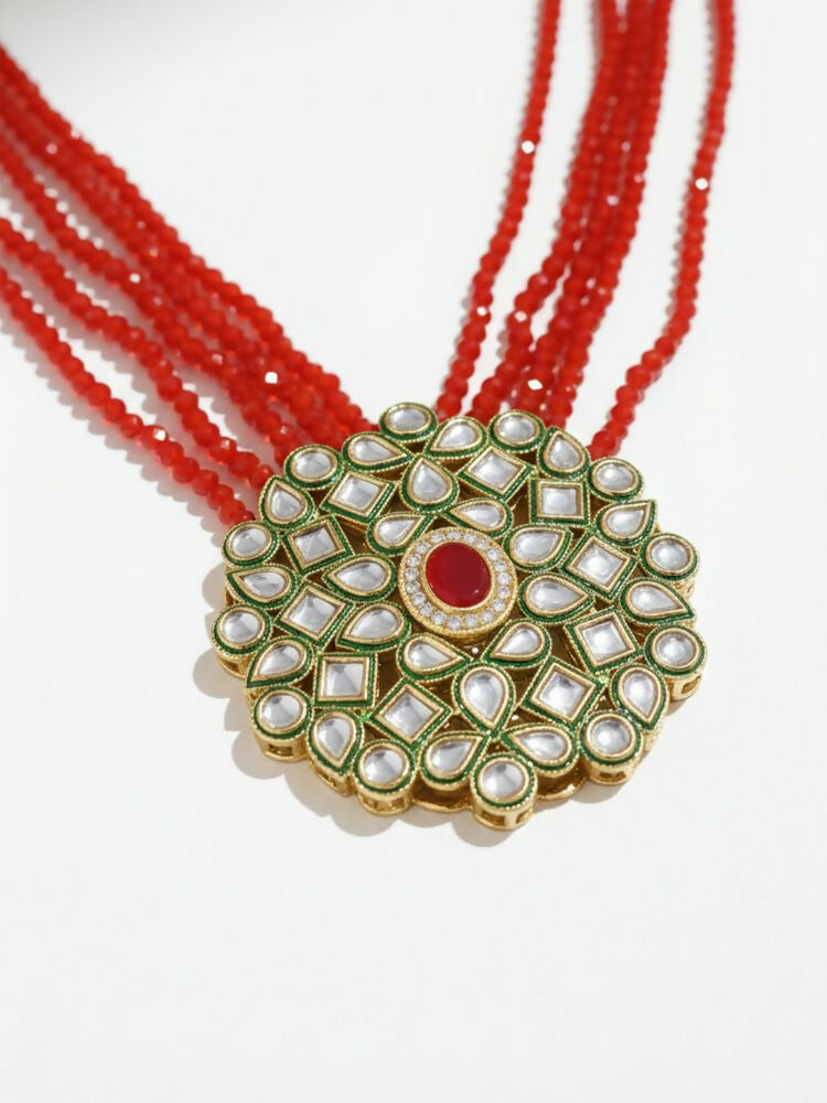 NVR Women Gold Plated Red Kundan Jewellery Set