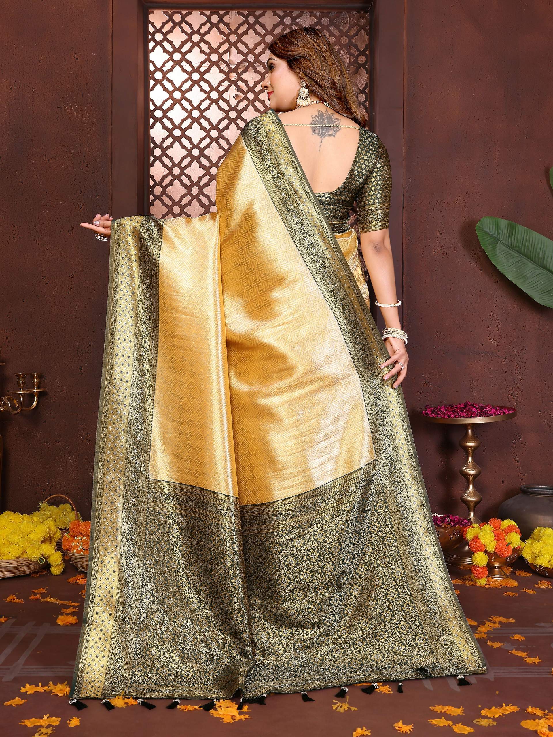 Aastha Fashion Cream Tissue Silk Woven Saree