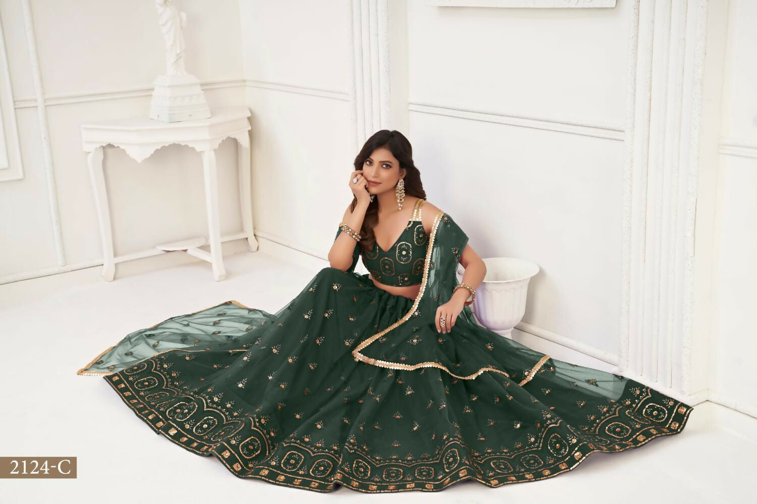 Aastha Fashion Dark Green Butterfly Net Tone To Tone Thread Work And Sandwich Sequence Work Embroidery Wedding Wear Lehenga Choli
