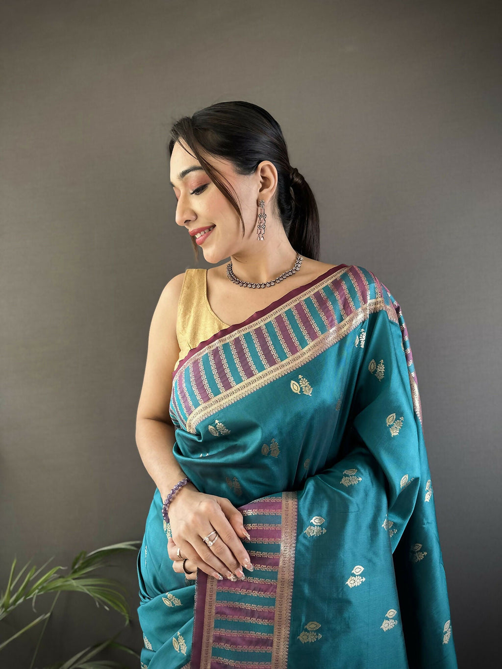 Joban Fashion Teal Blue Woven Zari Motifs Lichi Silk Banarasi Silk Saree