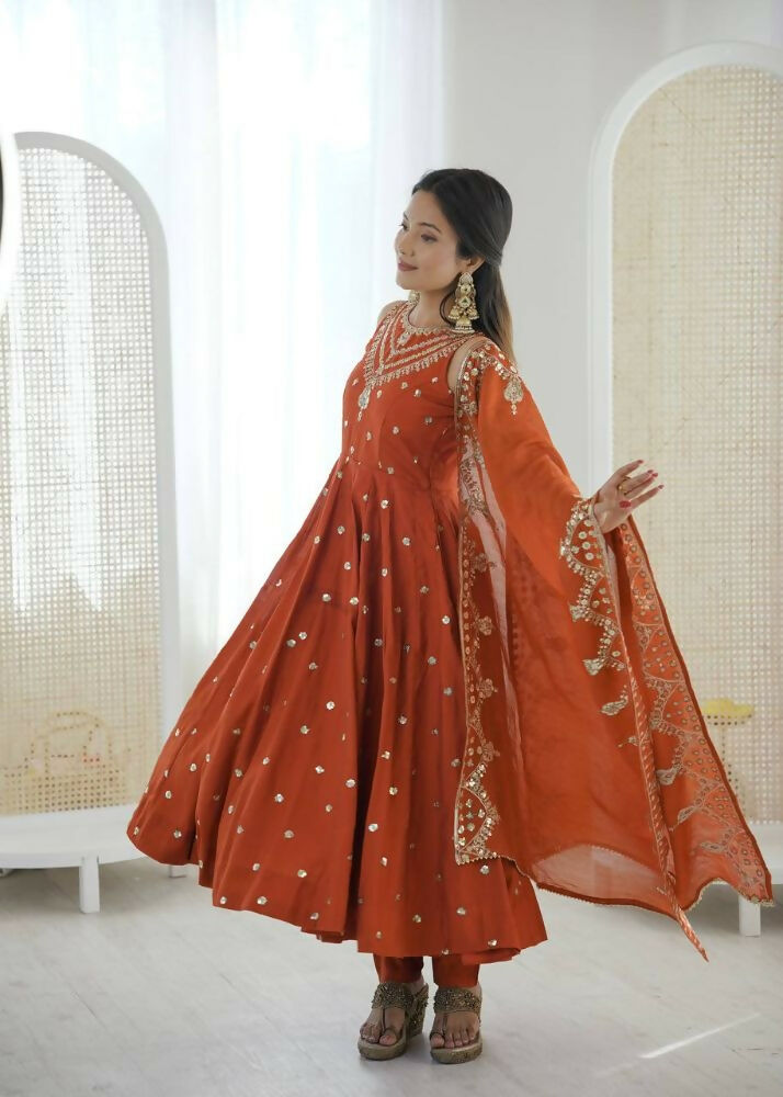 Teeya Creation Orange Color Roman Silk Embroidery Work Party Wear Gown
