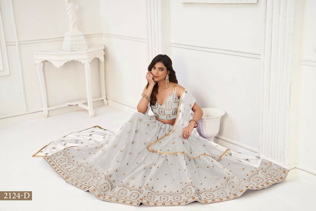 Aastha Fashion Off White Butterfly Net Tone To Tone Thread Work And Sandwich Sequence Work Embroidery Wedding Wear Lehenga Choli