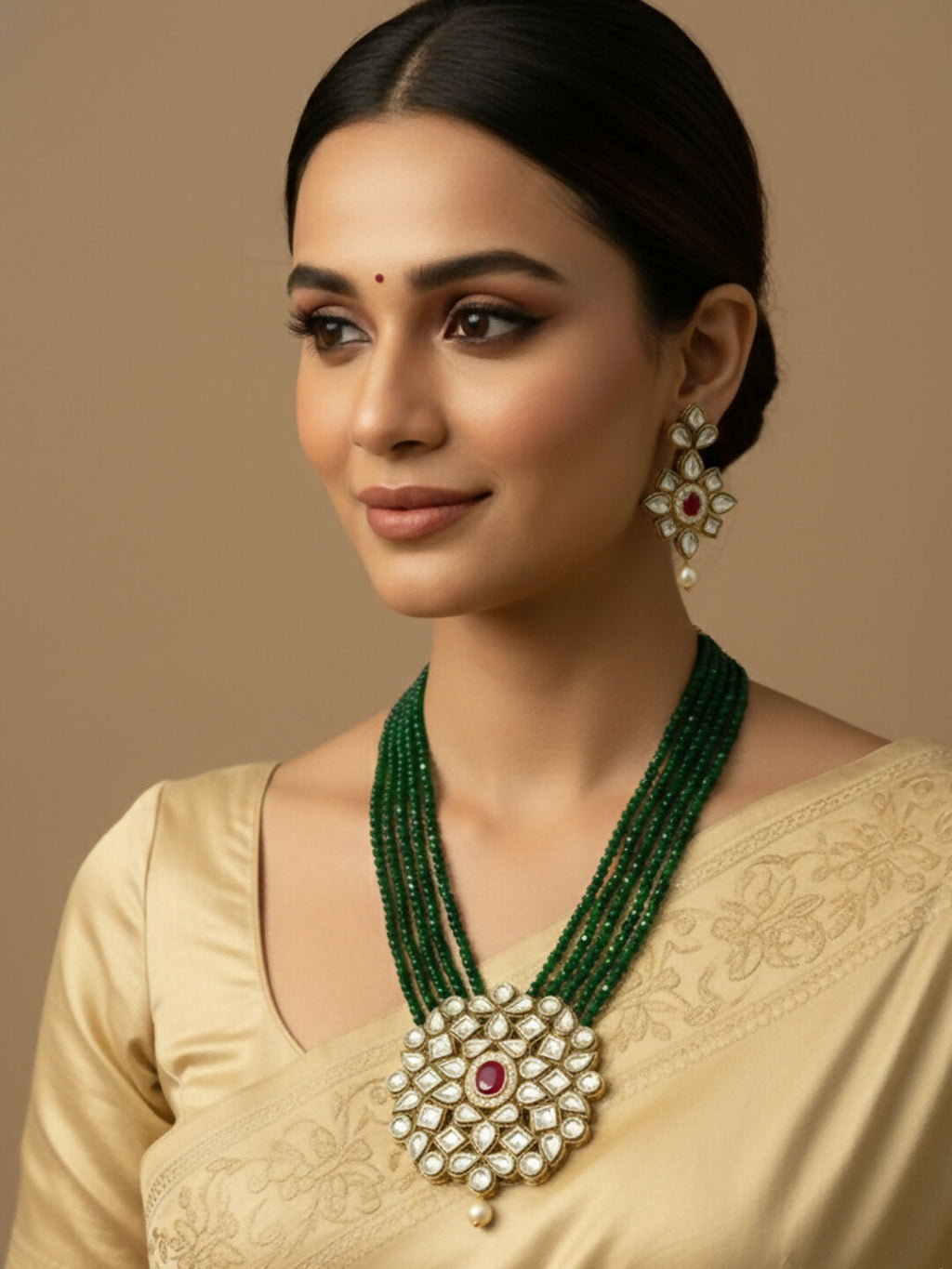 NVR Women Gold Plated Green Kundan Jewellery Set